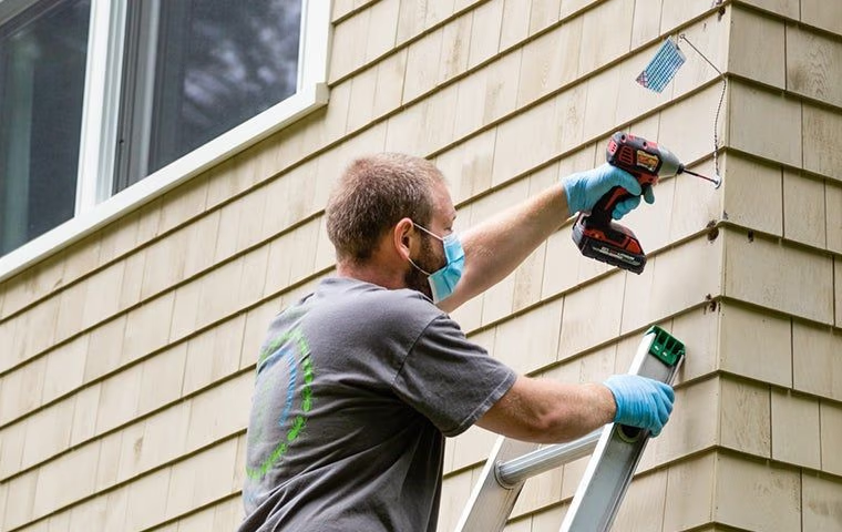 technician preparing house to prevent pests